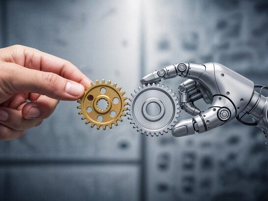 A human hand passing a gear to a robotic hand, representing the seamless collaboration between human expertise and AI