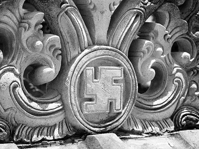 The swastika is an ancient symbol, estimated to be between 3,000 and 12,000 years old, typically depicted as an equilateral cross with four bent arms