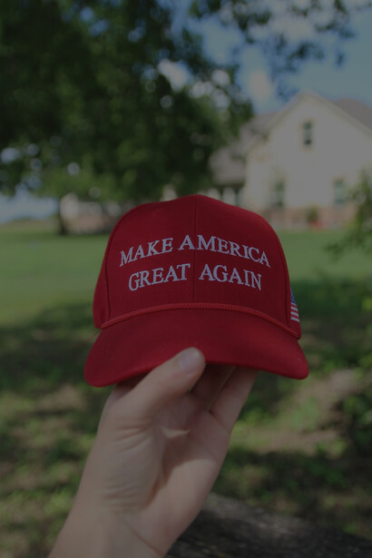 A red hat emblazoned with the slogan "Make America Great Again."