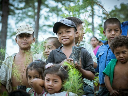 Children in the forests of Jocotán, Chiquimula, Guatemala, nurture seedlings as a local effort toward achieving the Sustainable Development Goals and promoting climate action