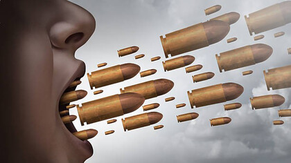 Fighting with hate speech, bullets coming out of a woman's mouth                 