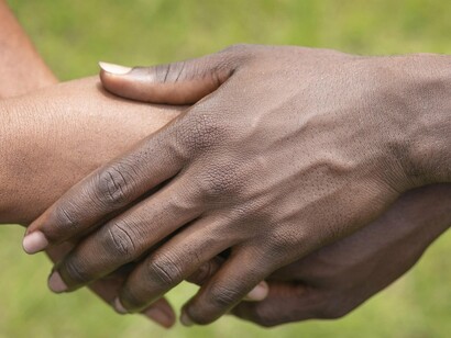 A simple hold, a powerful reminder that Africa’s regeneration begins with mutual support and shared purpose