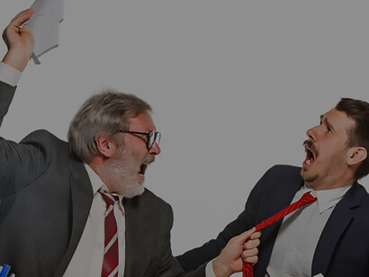 Navigate workplace conflicts efficiently as two business professionals engage in constructive dialogue to bridge understanding