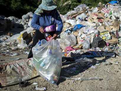 One inhabitant collects plastic bottles