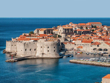Panoramic view of Dubrovnik, Croatia, showcasing the city walls and sea coastline