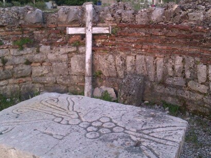 Incised stone with the cross at the monastery of Zlatica