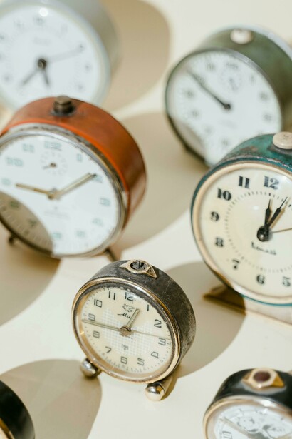 Clock casting a shadow, representing the passage of time