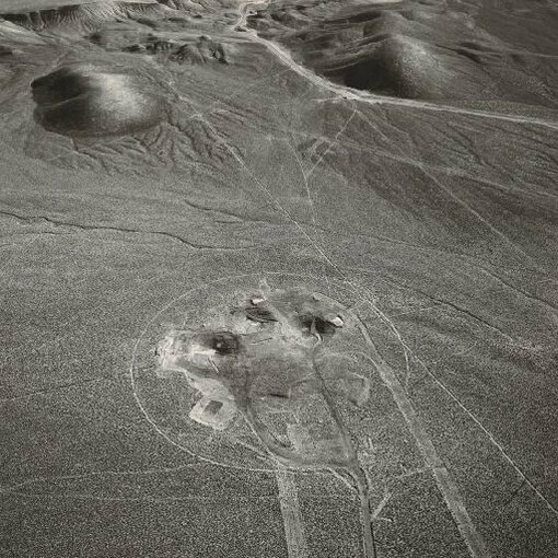 Emmet Gowin, Three subsidence craters within a security fence, Looking East, Area 10, Nevada Test Site (detail). Courtesy of Philadelphia Museum of Art