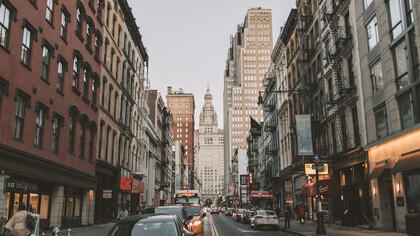 The vibrant streets of New York City, United States, come alive with the hustle and bustle of people and taxis, embodying the city's dynamic energy and allure