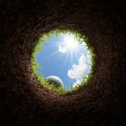 Golf ball before entering a hole