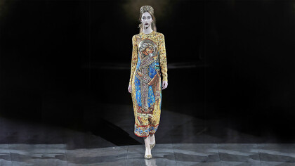 A model walks the runway at the Dolce & Gabbana fall 2013 ready-to-wear show in Milan, Italy