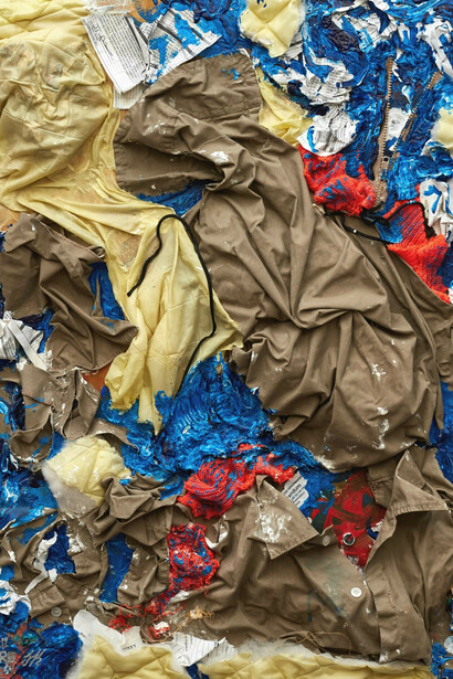 Gilberto Rivera, An Institutional Nightmare, 2012. Federal prison uniform, commissary papers, floor wax, prison reports, newspaper, acrylic paint on canvas. 32.25 x 24.25 inches. Collection Jesse Krimes.