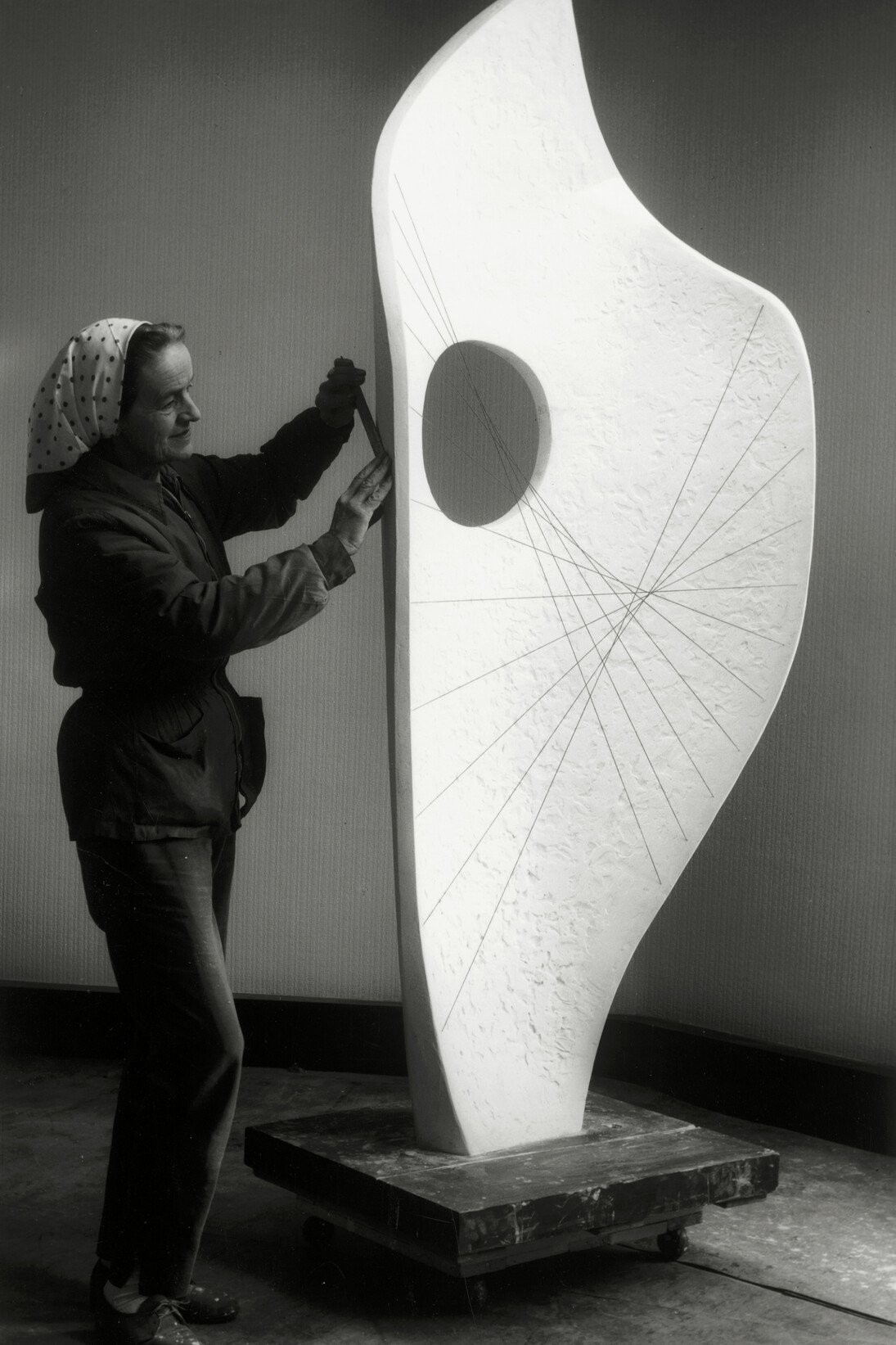Barbara Hepworth working on Curved Form, Bryher II, 1961, Courtesy Bowness, Hepworth Estate