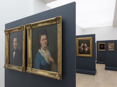 Feldmann negates paintings of nudes and respectable portraits by daubing them with black crosses, red noses and cross-eyes