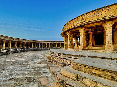 Located atop a hill, the Chausath Yogini Temple at Mitaoli (Mitawali, Mitavali) is a circular, open-air temple dedicated to the goddess tradition. It is nestled near the Bateshwar site, a cluster of around 200 Hindu temples, and the Padhavali site, which is renowned for its detailed Shiva temple carvings, making it a significant spiritual and historical landmark in India