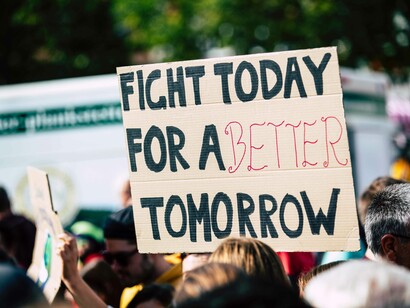 A well-penned sign that reads "fight today for a better tomorrow" is evoking the need to fight for our rights to live and a call to climate action