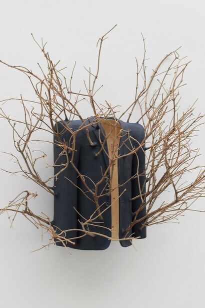 Hugh Hayden's Invisible Man (2025) is a sculptural work crafted from milk-painted sculpted fir and plywood. Measuring 120 × 178 × 87 cm (47¼ × 70⅛ × 34¼ in), the piece reflects Hayden's ongoing engagement with identity, visibility, and the social meanings embedded within familiar forms and materials. © Hugh Hayden. Courtesy of the artist and Lisson Gallery