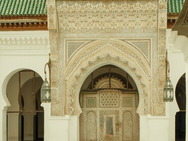 The entrance and courtyard fountain of Al Quaraouiyine University, Fez, Morocco, representing over twelve centuries of Islamic scholarship and architectural excellence