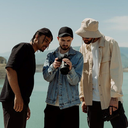 A group of friends travels the world, creating lasting memories as they snap photos to cherish their time together