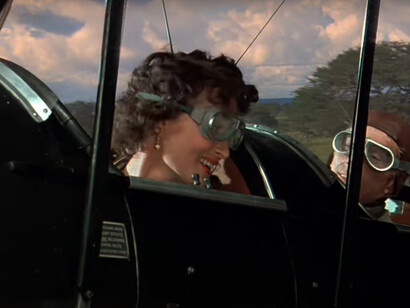 Experience the awe-inspiring beauty of Kenya as Robert Redford and Meryl Streep soar through the skies in the iconic movie 'Out of Africa,' delivering a visual feast for audiences worldwide