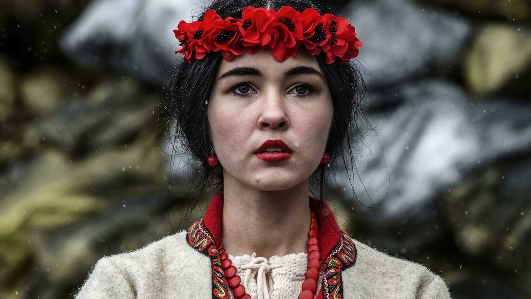 Giorgio Bianchi, Funeral in Kiev: A woman prays in front of a makeshift memorial set up to commemorate those killed in clashes on February 20.