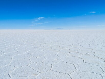 As the water evaporates under largely still conditions, the salt forms hexagonal shapes, Potosí, Bolivia