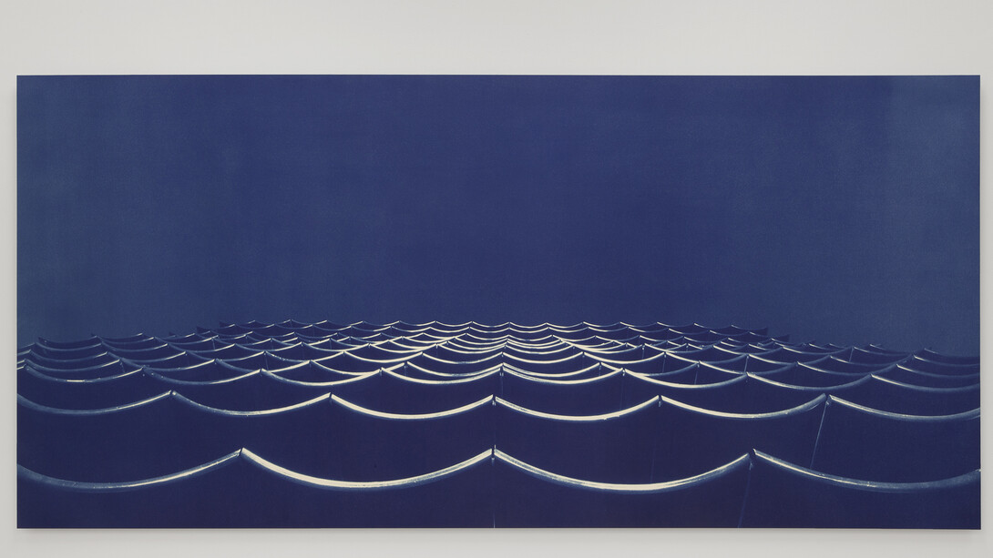 Bridget Smith, Blueprint for a Sea (series), 2015, four cyanotype prints on aluminium, five opaline globe lights, Courtesy Focal Point Gallery, Photo: Manuela Barczewski
