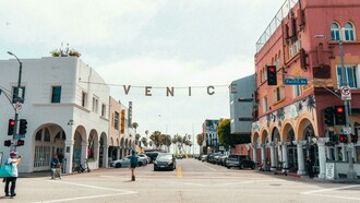 Pacific Avenue under the iconic Venice beach sign in Los Angeles, California, USA 