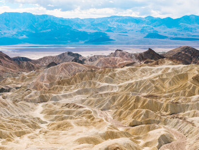 The rugged terrain of Zabriskie Point, Death Valley National Park, California, symbolizing California's leading position for meteor viewing opportunities