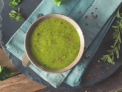 Culinary journey with the freshness of a raw, organic green Chimichurri sauce