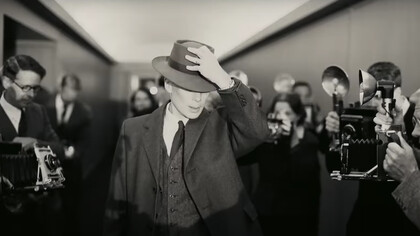 Cillian Murphy, in Oppenheimer movie as J. Robert Oppenheimer evading paparazzi