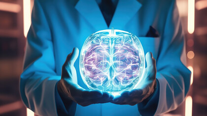 Neuroimaging studies explore emotions and brain activity, including facial expressions across cultures, with a doctor holding a brain