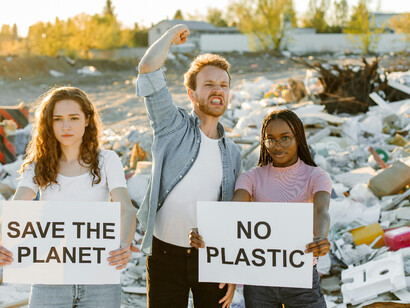 A group of youth unite at a waste site to demand environmental justice and solutions