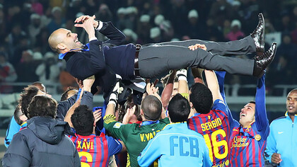 FC Barcelona's 2011 Team of the Year celebrates with Pep Guardiola lifted in the air