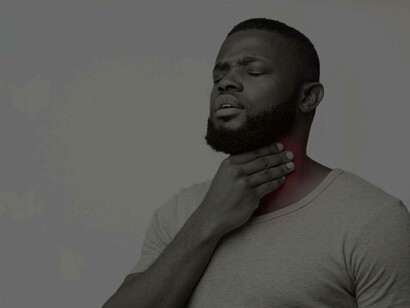 A searing and painful sore throat could be attributed to the acids traveling through the esophagus which might be caused by acid reflux as illustrated by this man