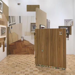 Installation view of Rachel Harrison Life Hack (Whitney Museum of American Art, New York, October 25, 2019–January 12, 2020). Should home windows or shutters be required to withstand a direct hit from an eight-foot-long two-by-four shot from a cannon at 34 miles an hour, without creating a hole big enough to let through a three-inch sphere?, 1996/2019. Photograph by Ron Amstutz