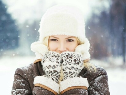 Her winter smile reminds us that the season holds more than cold—it holds quiet moments of peace