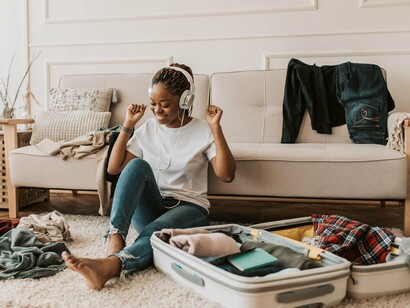 A traveller taking a moment to relax before setting off, reflecting how familiar routines can become anchors when everything else is about to change