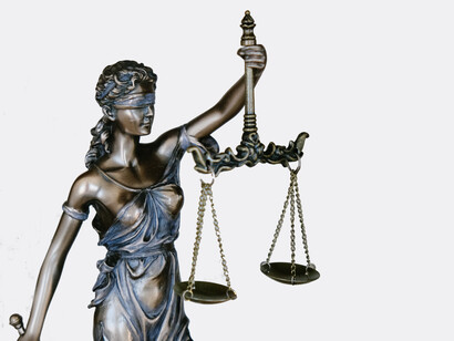 Lady Justice statue, an allegorical personification of the moral force in the judicial system