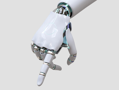 A human-like robot hand pointing down 