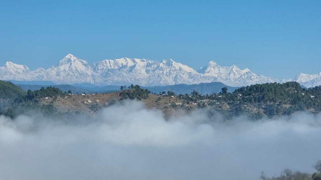 Spectacular view of snow clad Himalayan peaks from Dhamas Village, India