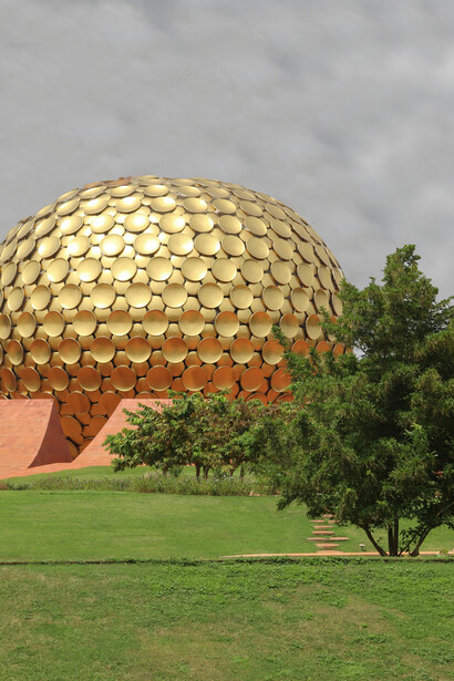Auroville is an experimental township located in the Viluppuram district of Tamil Nadu, India, with portions extending into the Union Territory of Puducherry. Founded in 1968 by Mirra Alfassa (known as "The Mother") and designed by French architect Roger Anger, Auroville was envisioned as a universal community dedicated to human unity and spiritual growth