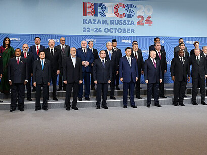 The leaders of BRICS member states assemble for the family photograph during the 16th BRICS Summit, hosted at the Kazan Expo Center in Russia on October 23, 2024. Pictured from left to right are: Abiy Ahmed (Prime Minister of Ethiopia), Abdel Fattah el-Sisi (President of Egypt), Cyril Ramaphosa (President of South Africa), Xi Jinping (President of China), Vladimir Putin (President of Russia), Narendra Modi (Prime Minister of India), and Mohammed bin Zayed Al Nahyan (President of the United Arab Emirates)