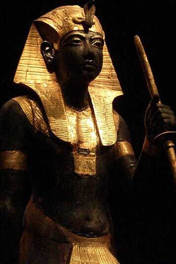 Wooden guardian statue of the Ka of the King wearing the Nemes Headcloth