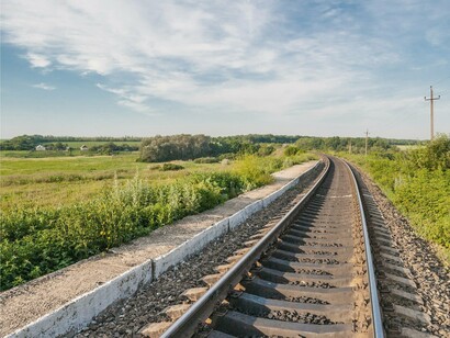 Railroads symbolize the backbone of territorial connectivity, linking cities and regions into shared development