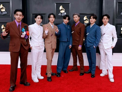 The male K-Pop group BTS showing off their fashion on the red carpet at the Grammy Awards