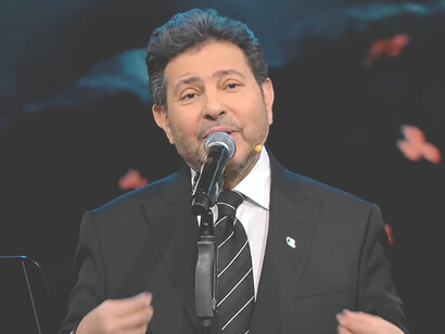An acclaimed Egyptian singer, actor, and composer, Hany Abdel Aziz Shaker made his first public appearance singing with Abdel Halim Hafez’s choral group in "Sora." He subsequently took on the role of the young Sayed Darwish in the biographical film Sayed Darwish
