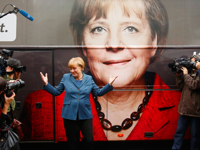 Angela Merkel and her poster