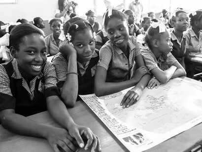 Chilean Defense Minister José Antonio Gómez visits students at the newly rebuilt República de Chile School in Port-au-Prince