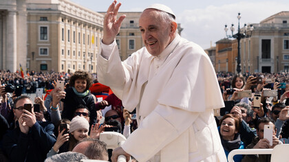 Pope Francis answering the cheers of the crowd in Vatican City